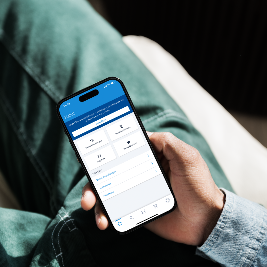 Man holding mobile with app